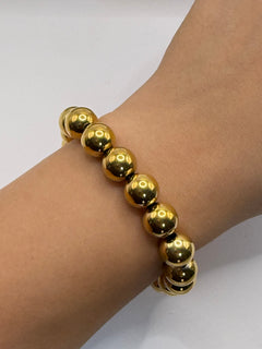 PULSERA CUENCA DORADO