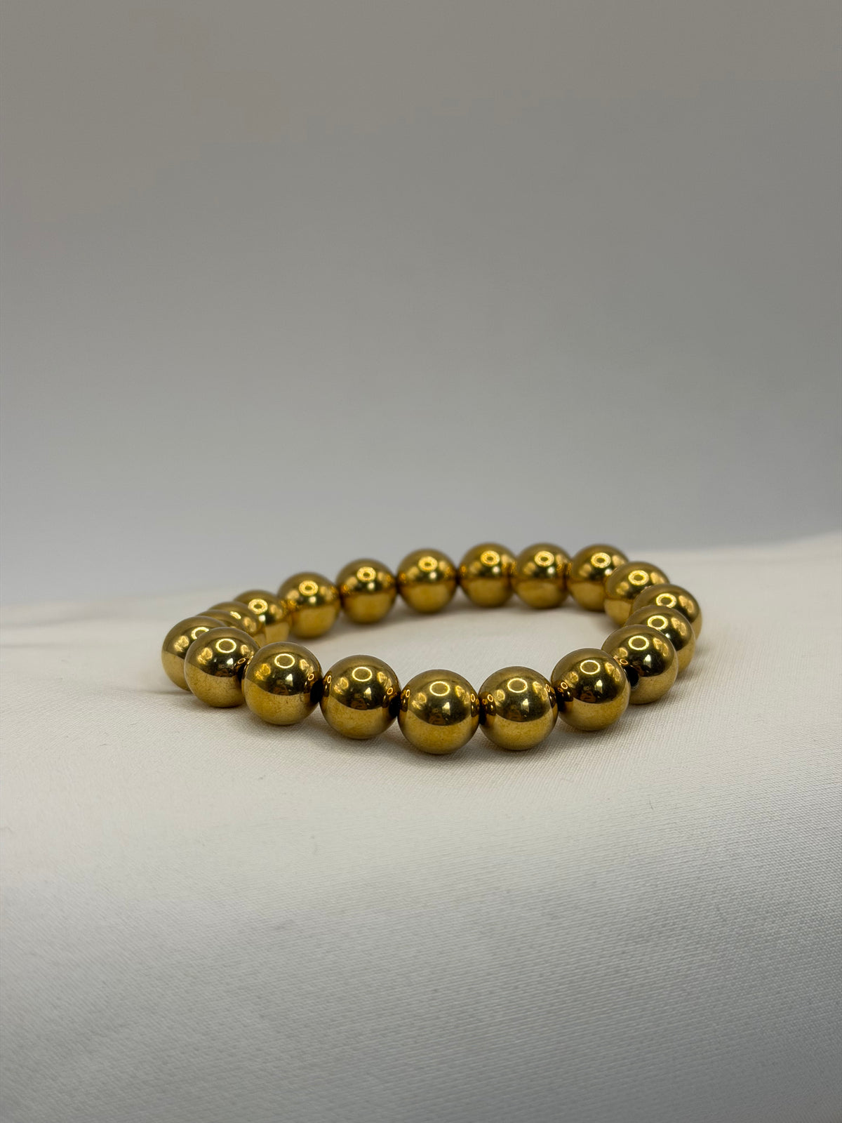 PULSERA CUENCA DORADO