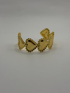 PULSERA CORAZONES DORADA