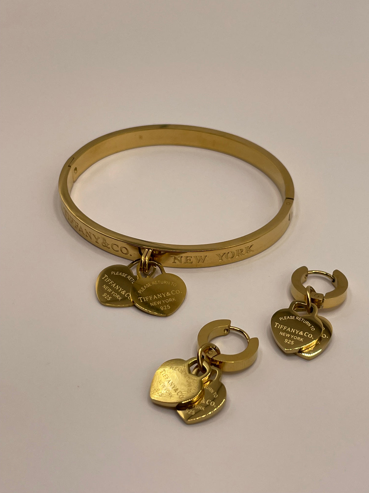 CONJUNTO PULSERA ARETES TIFFANY DORADO