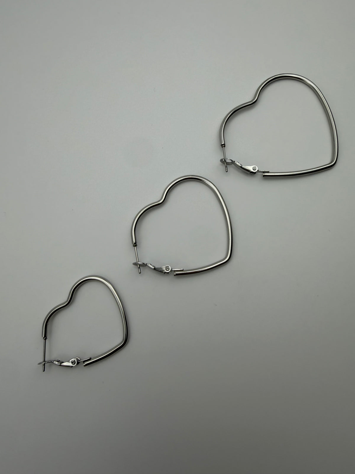 CONJUNTO 3 PARES CORAZON PLATA