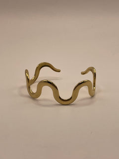 PULSERA ONDA DORADA