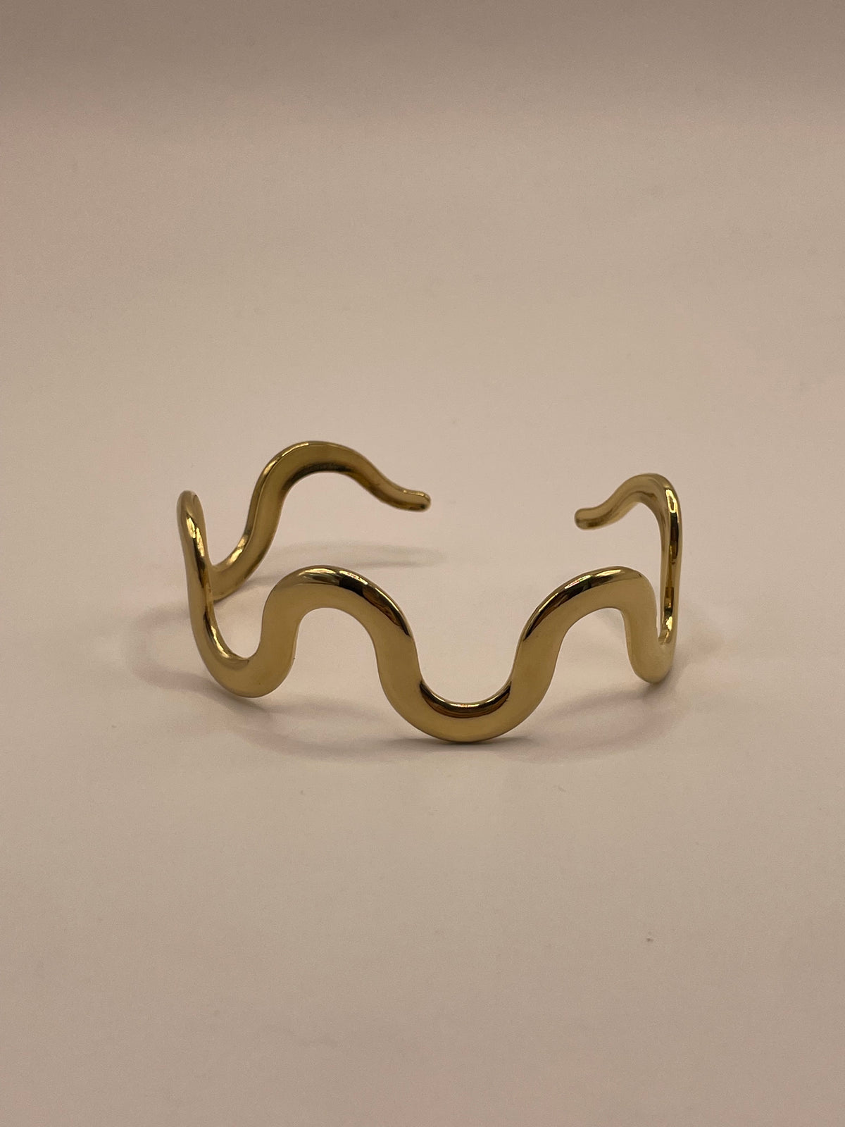 PULSERA ONDA DORADA