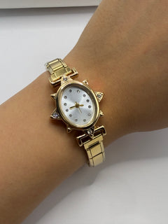 RELOJ ESTRELLA DORADO