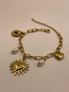 PULSERA DORADA CORAZON SOL