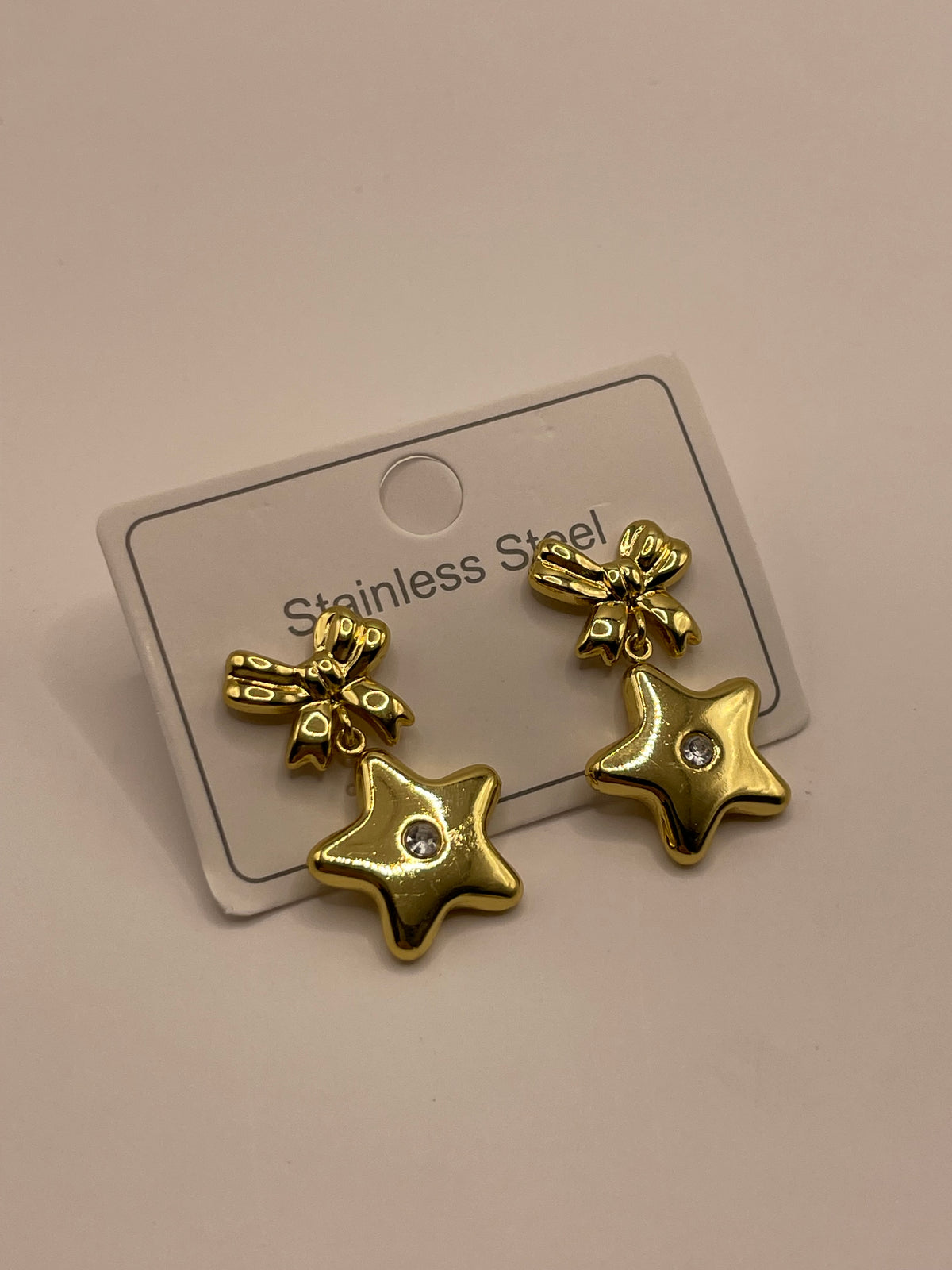 ARETES ESTRELLA MOÑO