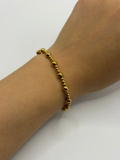 PULSERA CUENCAS DELGADA DORADA