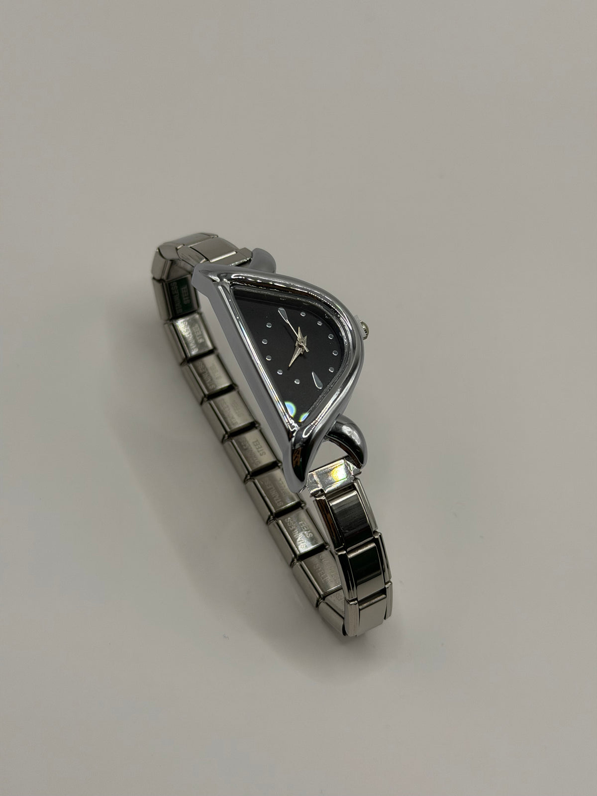 RELOJ MEDIA LUNA PLATA