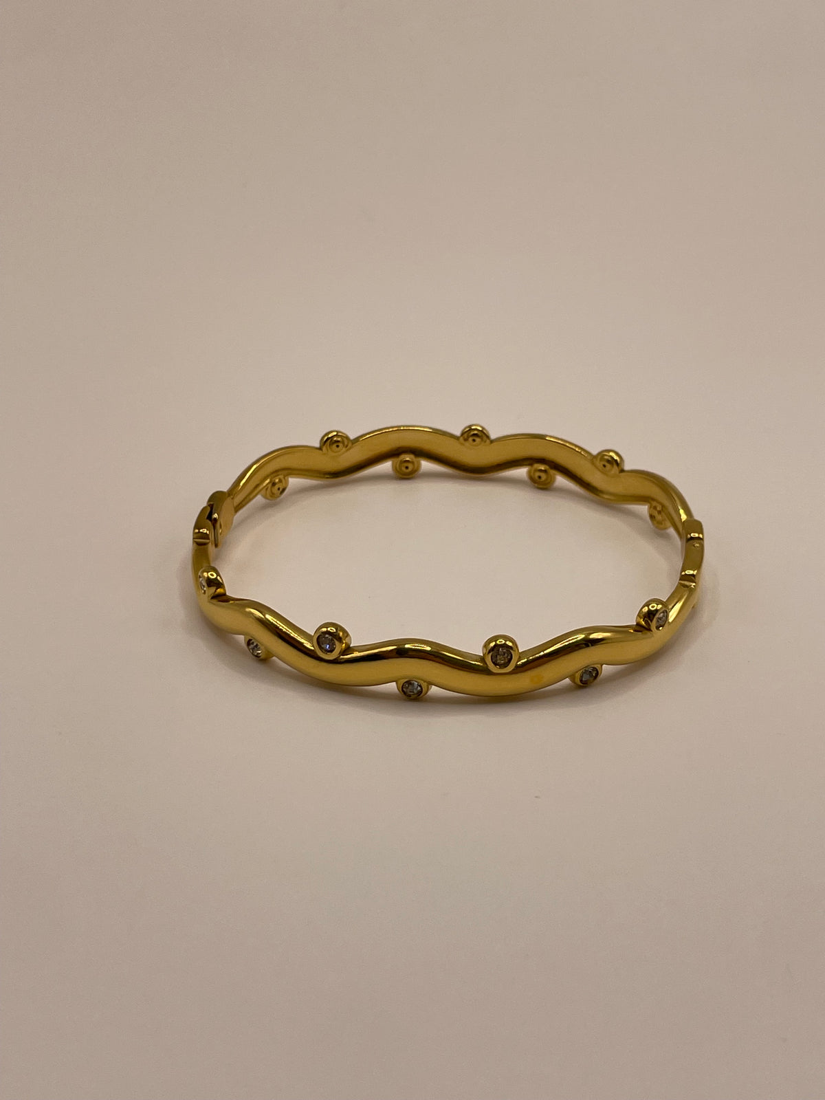 PULSERA DORADA ONDAS ZIRCONIAS