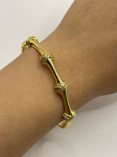 PULSERA X DORADA
