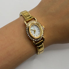 RELOJ ITALIANO DORADO OVALADO GLOW