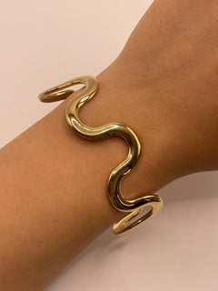 PULSERA ONDA DORADA