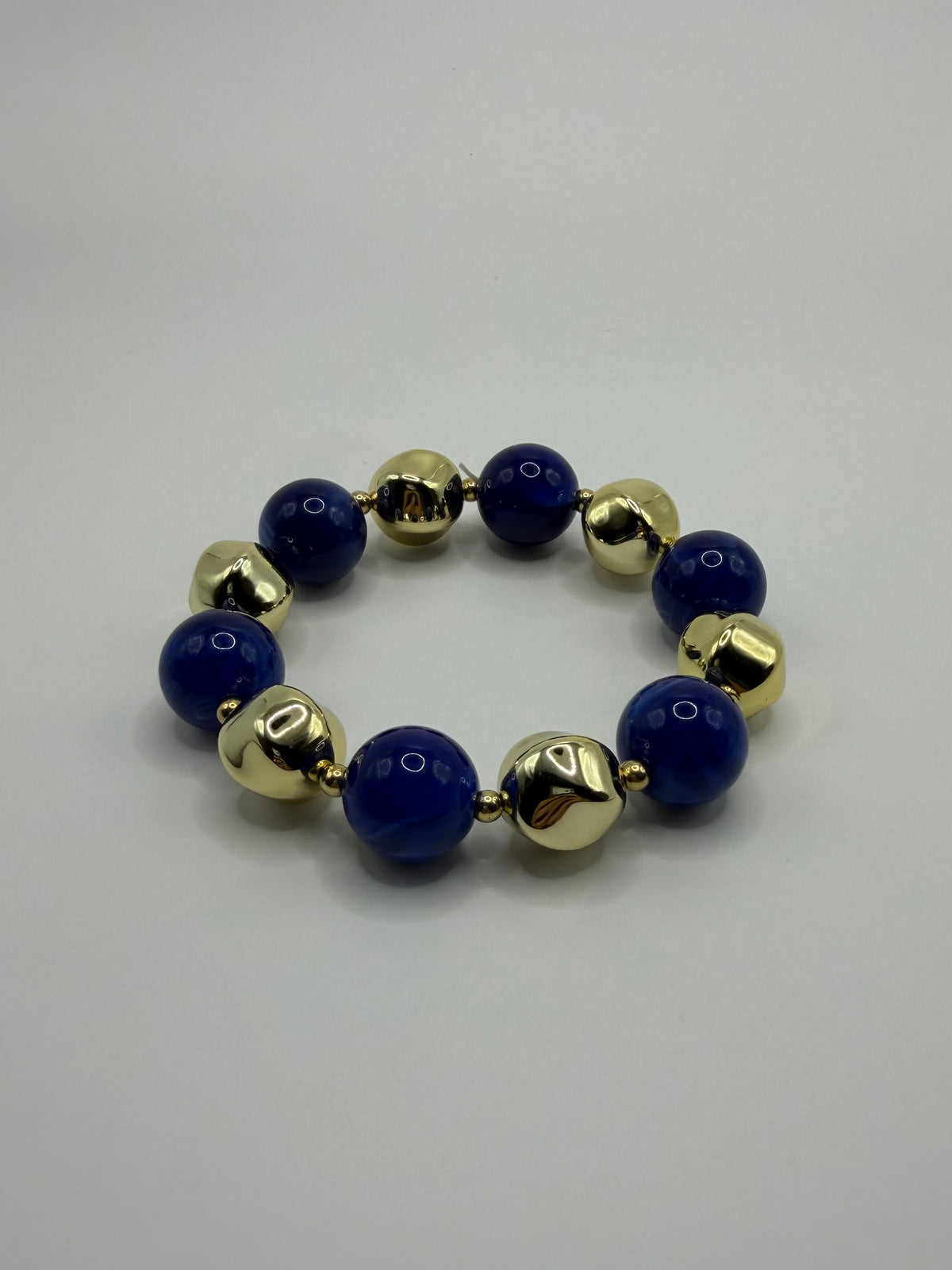 PULSERA CUENCAS AZUL DORADO