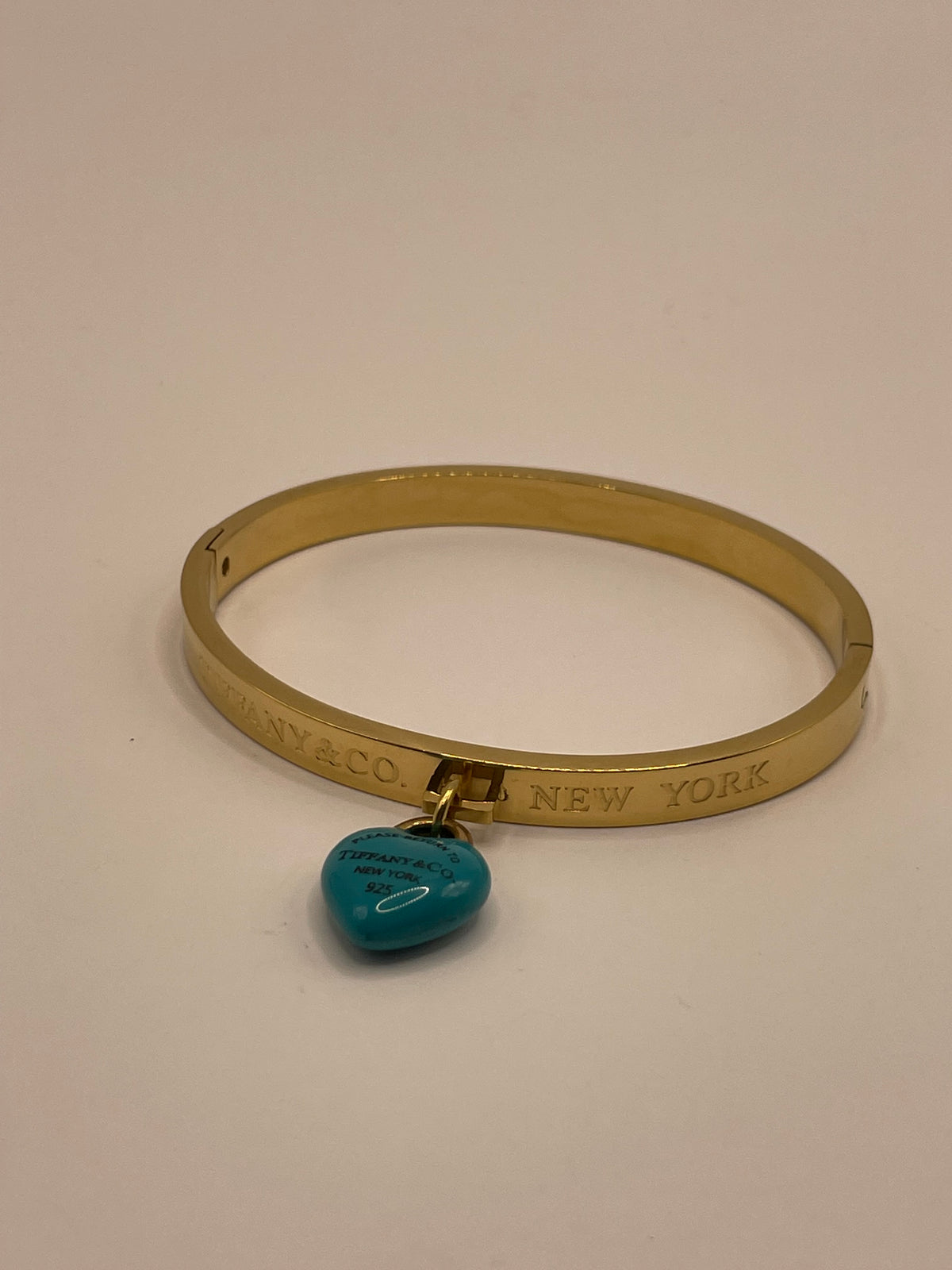 PULSERA DORADA CORAZON AZUL