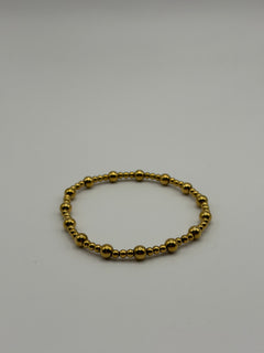 PULSERA CUENCAS DELGADA DORADA
