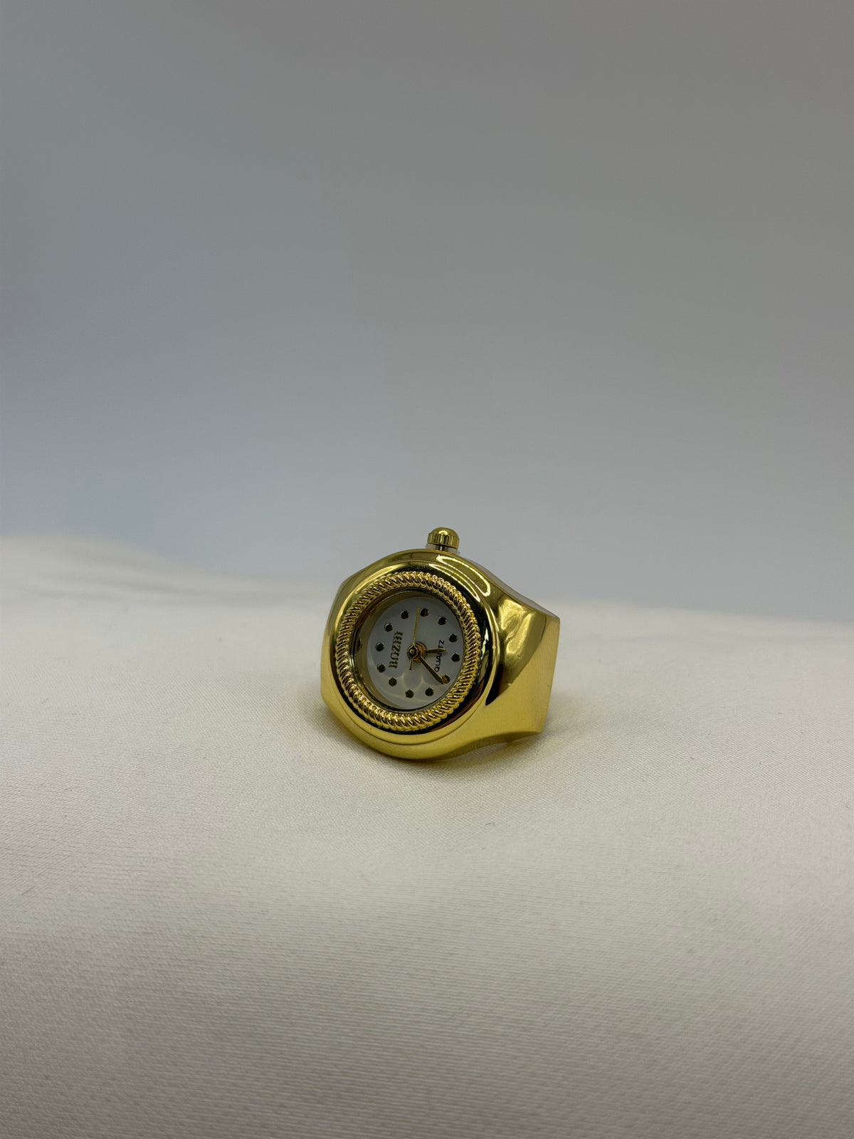 ANILLO RELOJ CIRCULAR DORADO