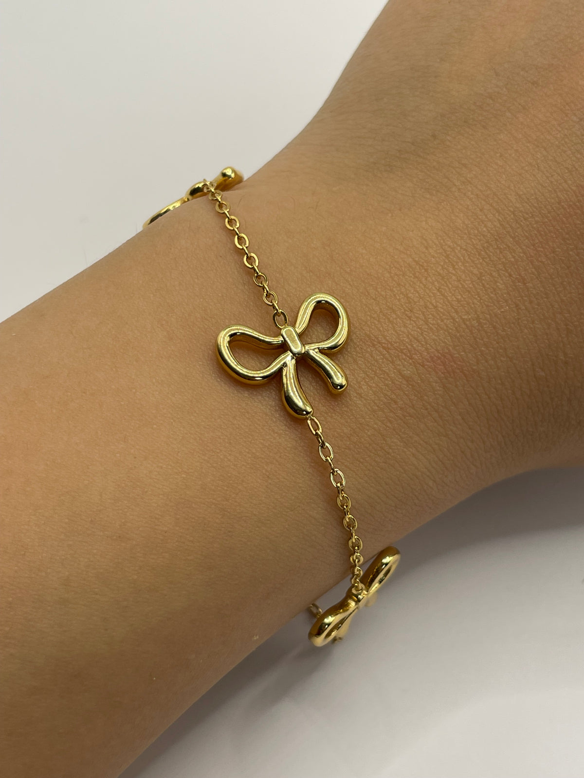 PULSERA MOÑOS DORADA