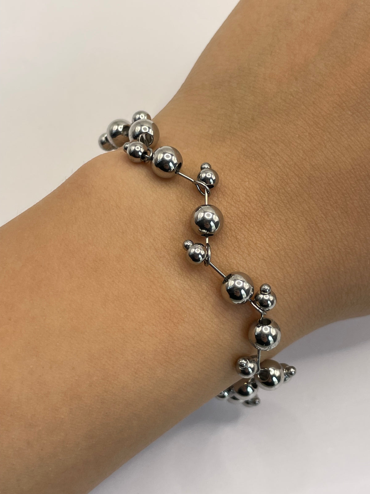 PULSERA CUENCAS ALEATORIAS PLATA
