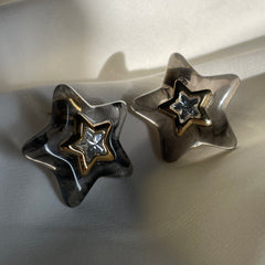 ARETES ESTRELLA AMBAR NEGROS