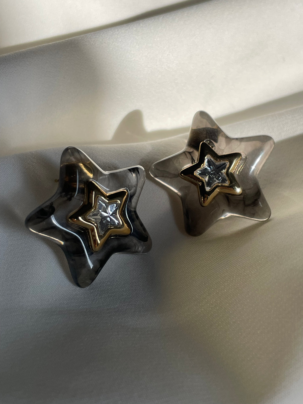 ARETES ESTRELLA AMBAR NEGROS