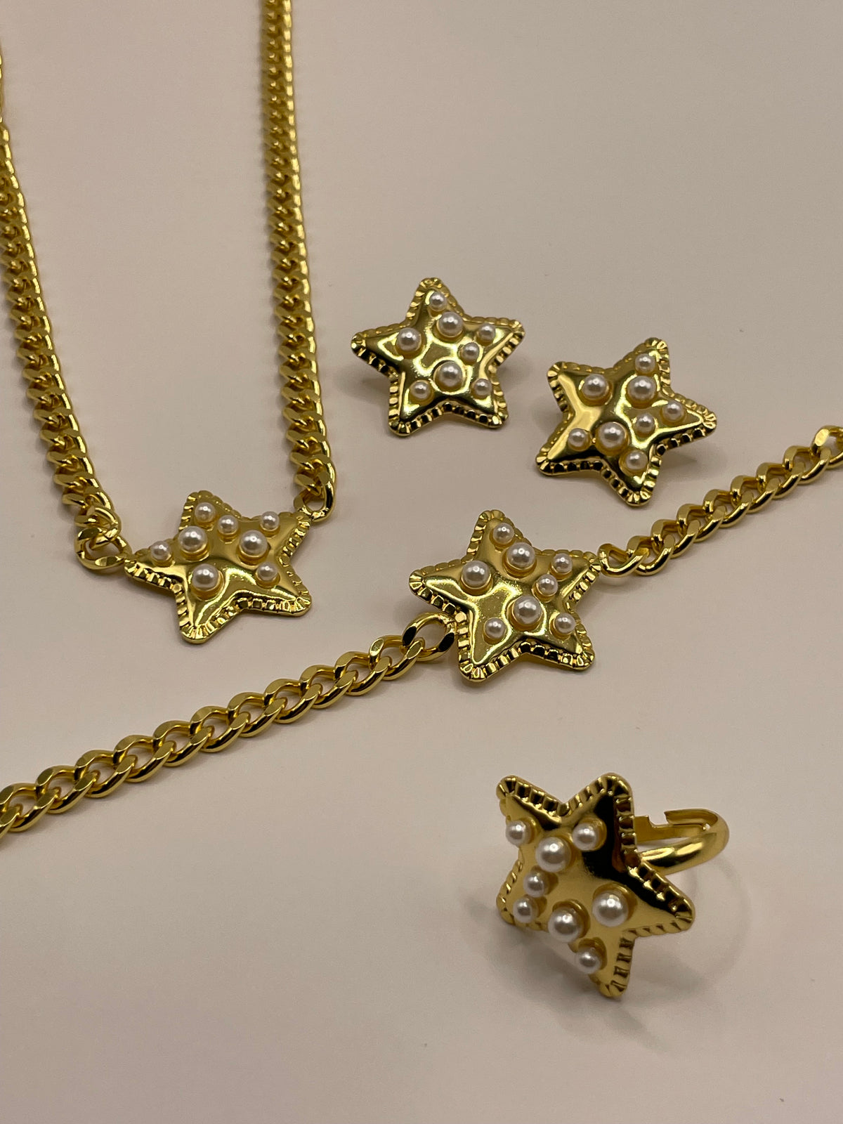 CONJUTO 4 PIEZAS DORADA ESTRELLA