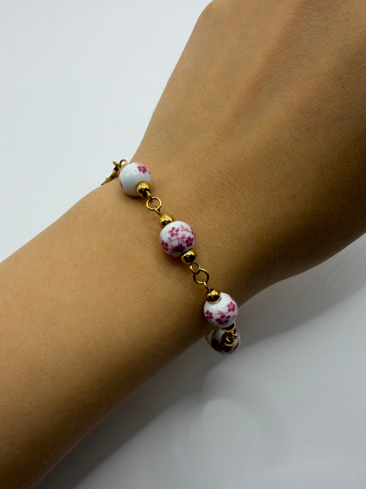 PULSERA SEMILLA ROSA