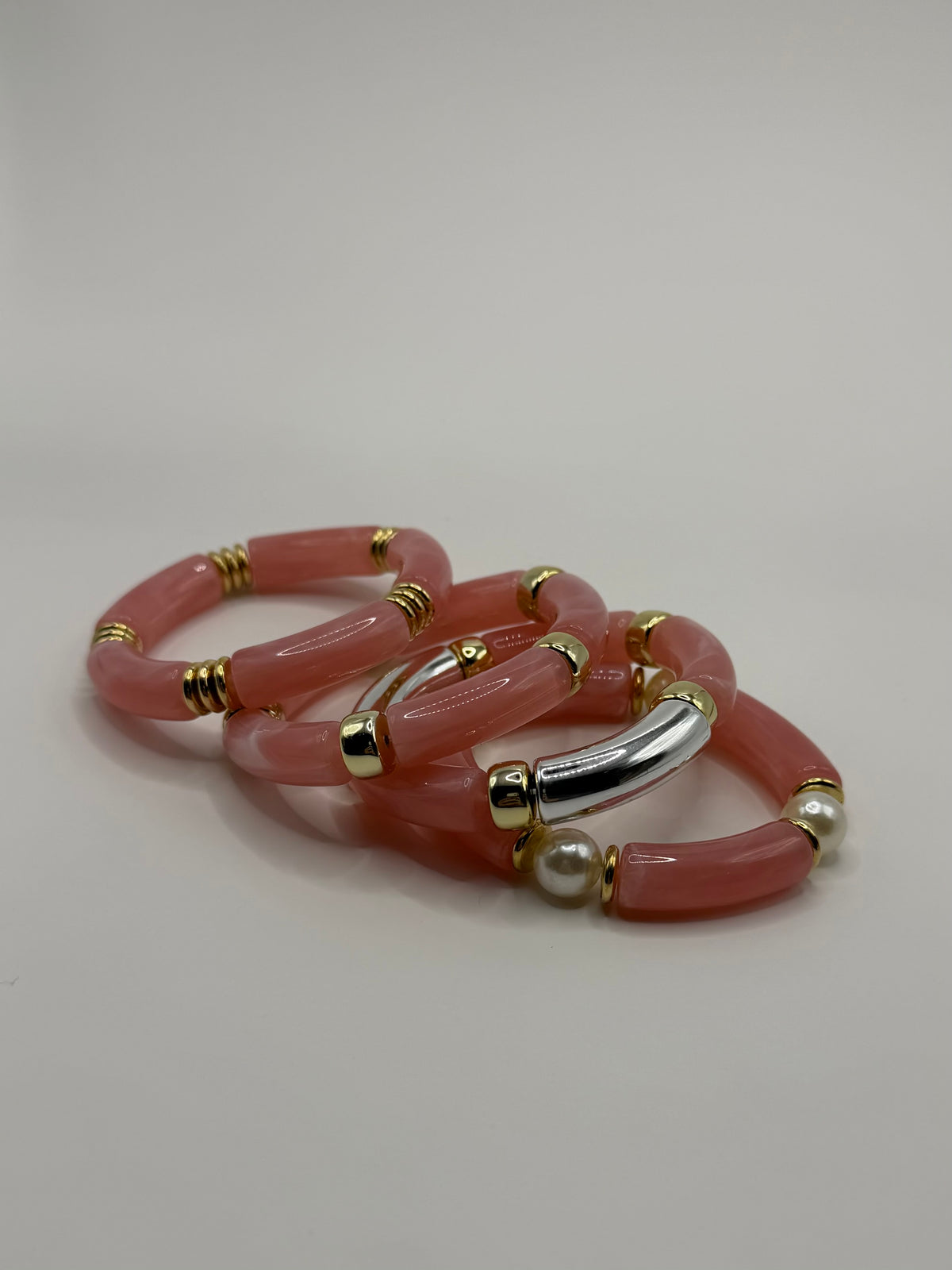 CONJUNTO PULSERAS ROSA 4 PIEZAS
