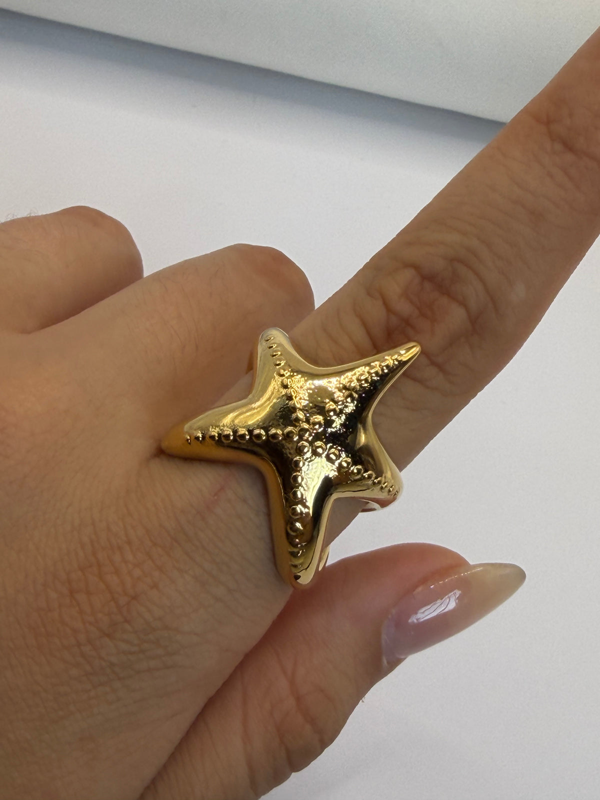 ANILLO ESTRELLA MAR DORADO