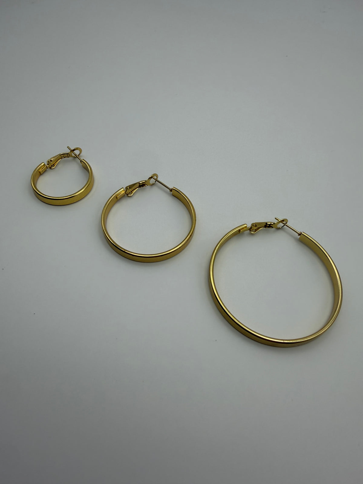 CONJUNTO ARETES COQUETAS LISO