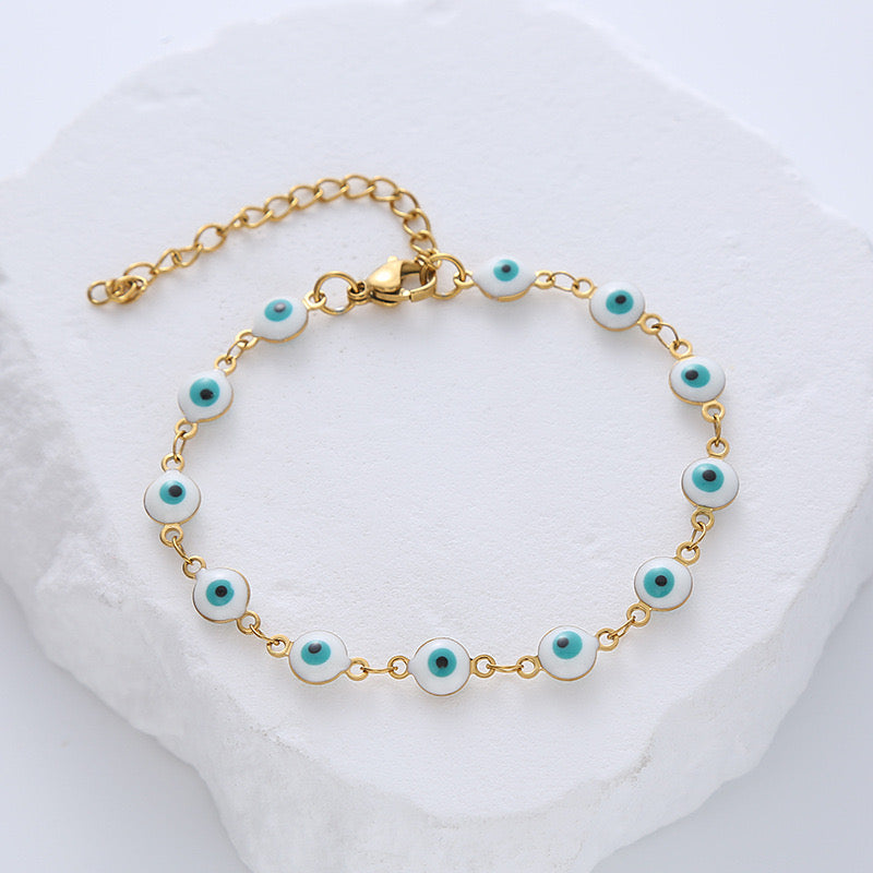 PULSERA OJOS BLANCA