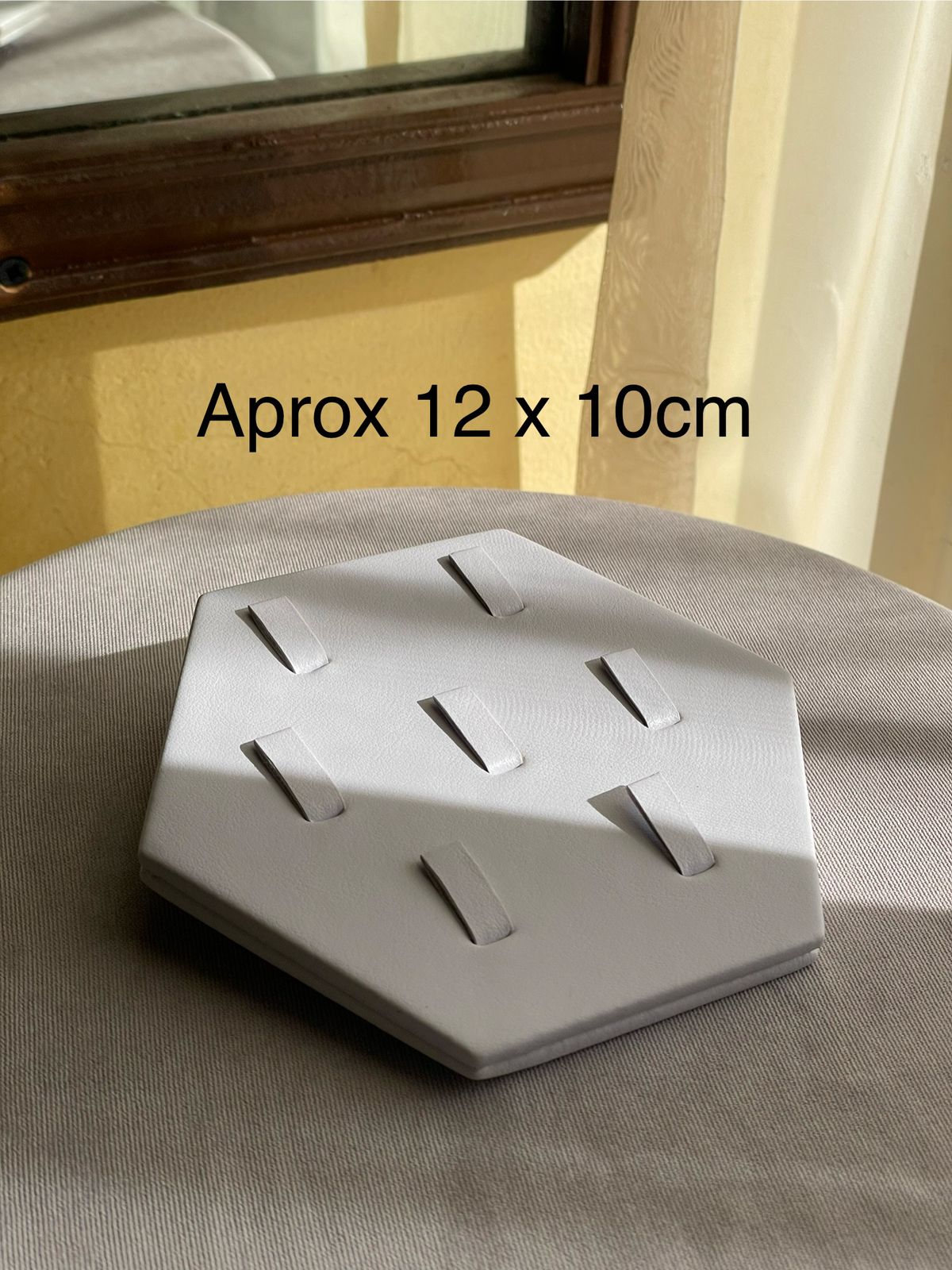 EXHIBIDOR DE ANILLOS