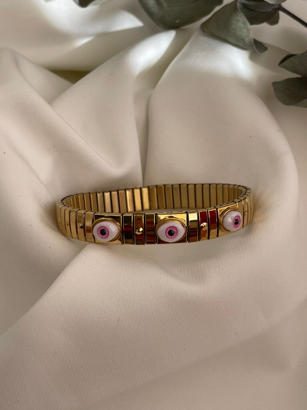 PULSERA OJOS ROSA