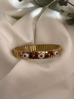 PULSERA OJOS ROSA