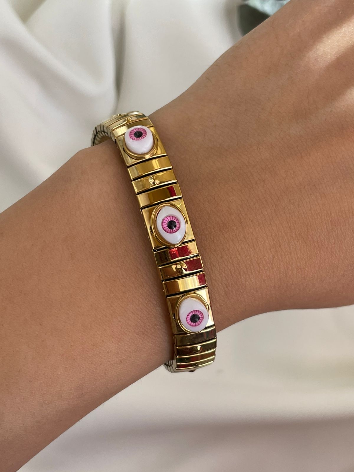 PULSERA OJOS ROSA