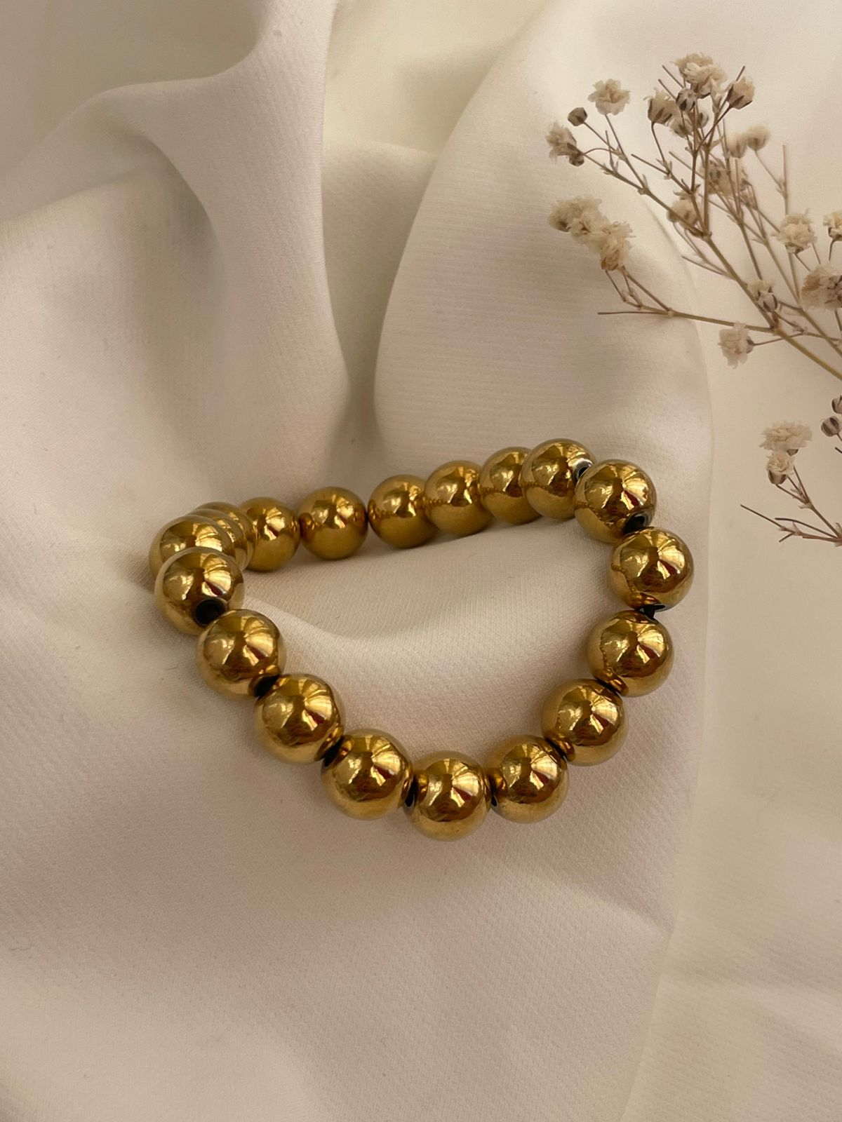 PULSERA CUENCAS DORADA