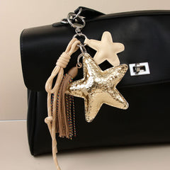 LLAVERO BABY STAR DORADA