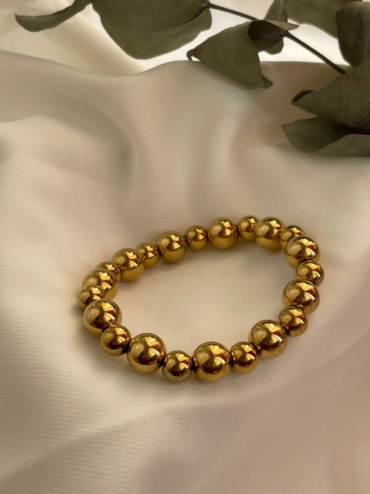 PULSERA CUENCAS DORADA